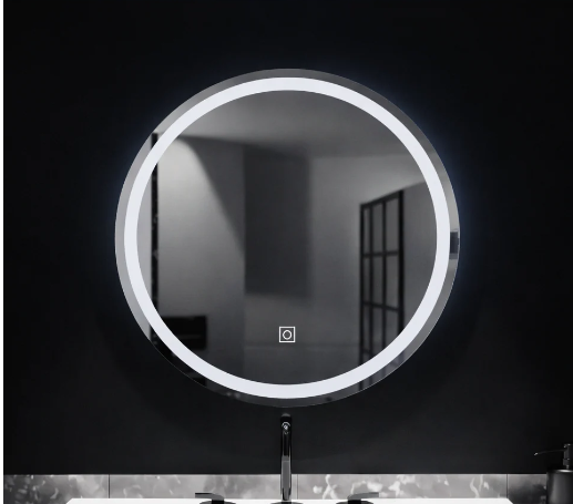 Round LED-lit bathroom mirror above a sink with a chrome faucet, reflecting a dim room.