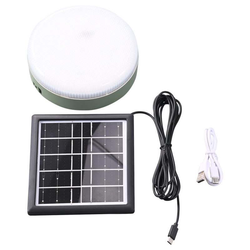 Solar-powered outdoor lighting kit with a round LED lamp, a solar panel, and a USB charging cable