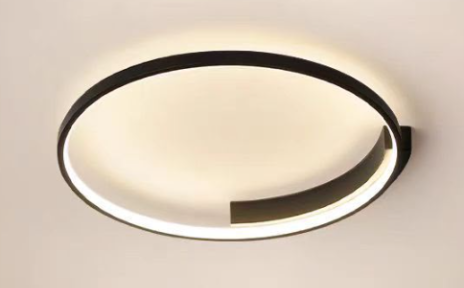 Modern circular ceiling light fixture with an integrated ring that emits soft white light.