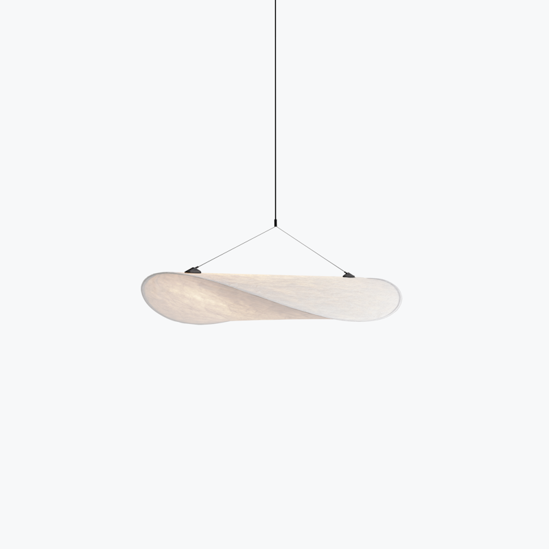 Modern suspended pendant light with a curved wooden shade, hanging from a black cord attached to a round ceiling mount.