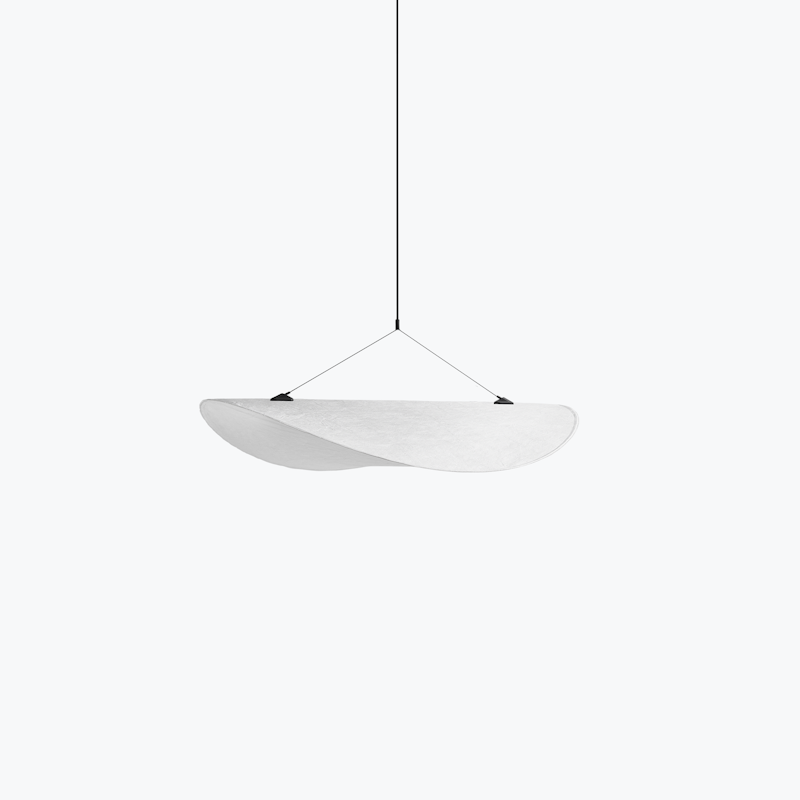 Suspended pendant light with a curved white shade hanging from a thin black cord.