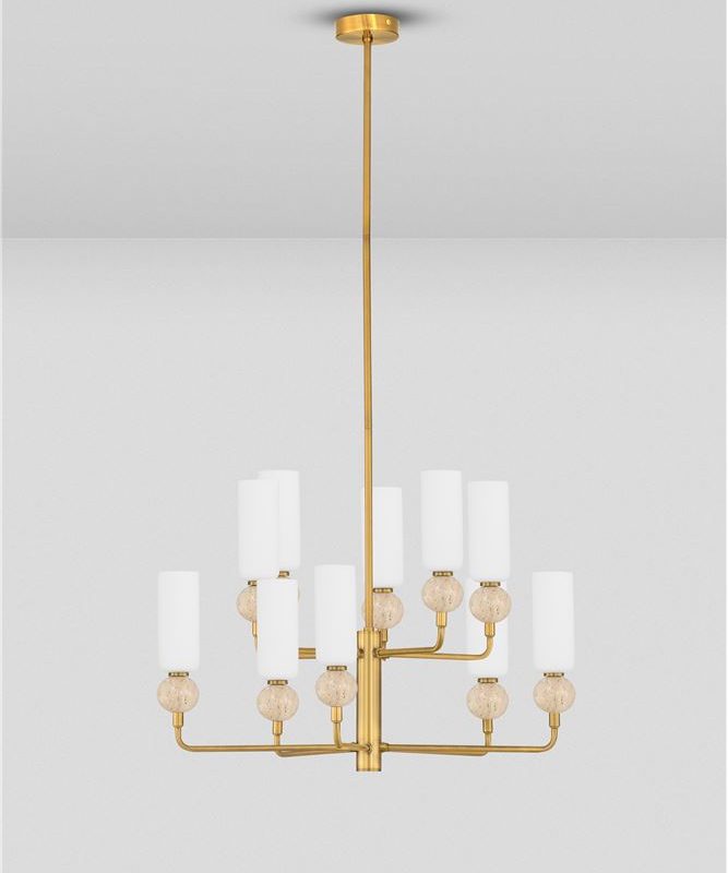 Gold chandelier with multiple arms and white cylindrical shades hanging from a ceiling mount in a bright room.