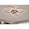 Modern ceiling light fixture with interlocking glowing circular rings in a living room.