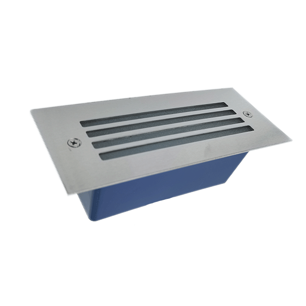 Metal floor vent grate with four parallel slots, mounted over a blue recessed housing.