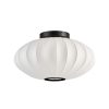 White round lantern-style ceiling light with ribbed panels and a black mount description of the fixture