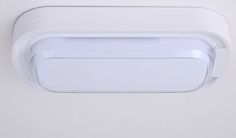 White rectangular ceiling light with rounded edges, a modern flush-mount fixture.
