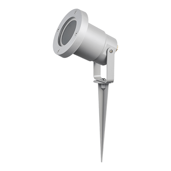 Silver outdoor landscape spotlight mounted on a ground stake for garden lighting