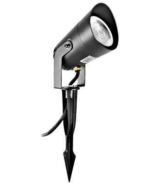 Black outdoor spotlight mounted on a stake with a hinged head for garden lighting