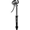 Outdoor ground stake light with an adjustable black metal spotlight on a pointed stake (landscape lighting).